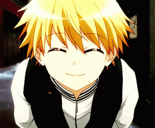 A Close Up Of A Person 'S Face With Yellow Hair GIF