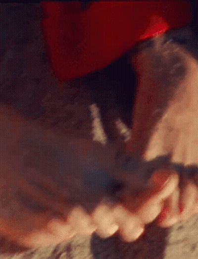 A Close Up Of A Person 'S Feet With Red Nail Polish On Them GIF