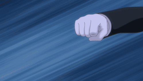 A Close Up Of A Person 'S Fist Against A Dark Blue Background GIF