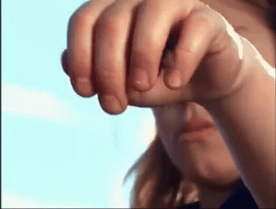 A Close Up Of A Person 'S Fist With A Bandage On It . GIF