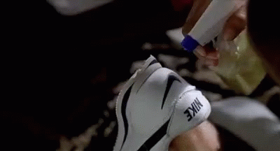 A Close Up Of A Person 'S Foot With A Nike Shoe On It . GIF