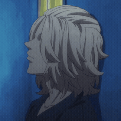 A Close Up Of A Person 'S Hair Against A Blue Wall GIF