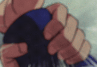 A Close Up Of A Person 'S Hand Holding A Blue Object GIF