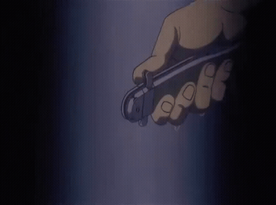 A Close Up Of A Person 'S Hand Holding A Bottle Of Water In A Dark Room . GIF