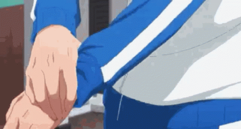 A Close Up Of A Person 'S Hand Holding Another Person 'S Wrist . GIF