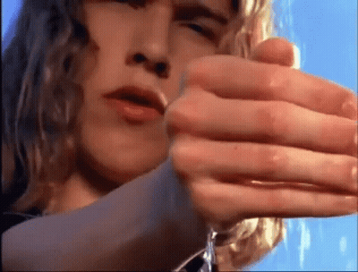 A Close Up Of A Person 'S Hand Holding Something GIF