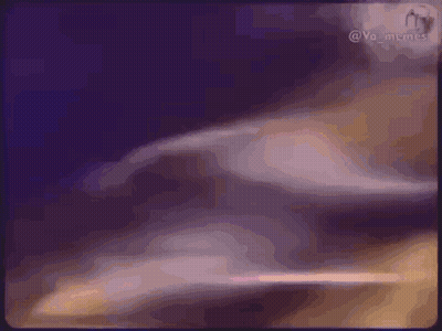 A Close Up Of A Person 'S Hand On A Blue Background . GIF