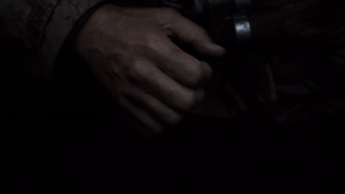 A Close Up Of A Person 'S Hand On A Metal Pipe GIF