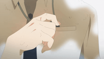 A Close Up Of A Person 'S Hand On A Shirt GIF