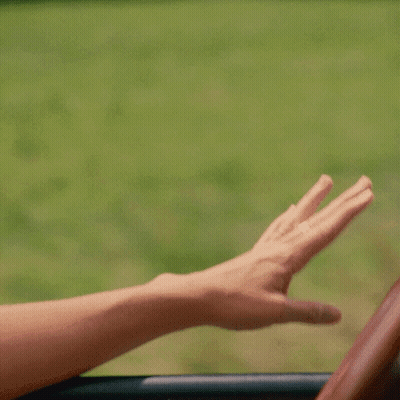 A Close Up Of A Person 'S Hand Reaching Out Towards A Window GIF