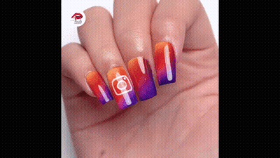 A Close Up Of A Person 'S Hand With Colorful Nails And A Instagram Logo On Them GIF