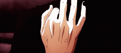 A Close Up Of A Person 'S Hand With Sharp Claws GIF
