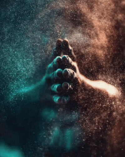 A Close Up Of A Person 'S Hands In A Dark Room GIF
