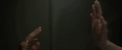 A Close Up Of A Person 'S Hands With Rings On Their Fingers GIF