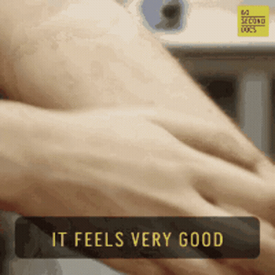 A Close Up Of A Person 'S Hands With The Words " It Feels Very Good " Above Them GIF