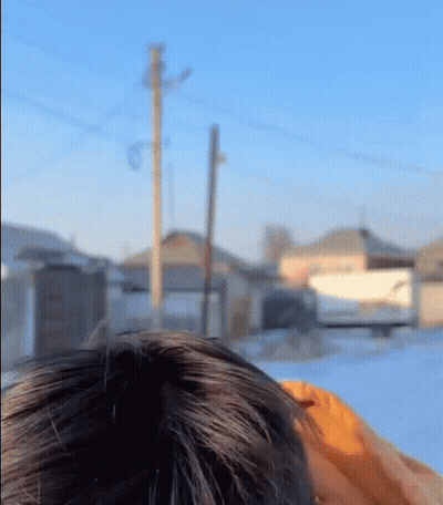 A Close Up Of A Person 'S Head With A Blurred Background GIF