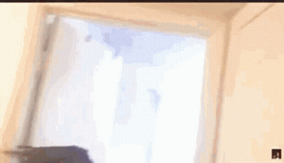 A Close Up Of A Person 'S Head With A Hat On . GIF