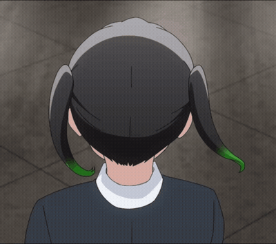 A Close Up Of A Person 'S Head With A White Collar And Green Hair GIF