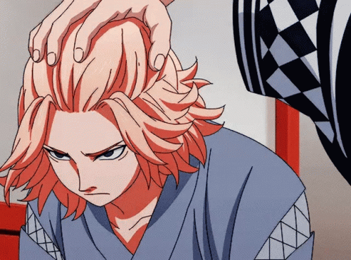 A Close Up Of A Person 'S Head With Their Hand On It GIF