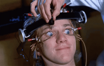 A Close Up Of A Person 'S Head With Wires On It GIF