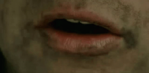 A Close Up Of A Person 'S Mouth And The Words Share The Load GIF