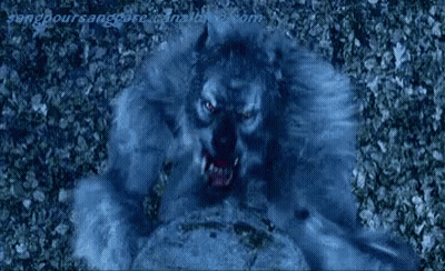 A Close Up Of A Person 'S Mouth With Teeth Coming Out Of It 'S Mouth . GIF