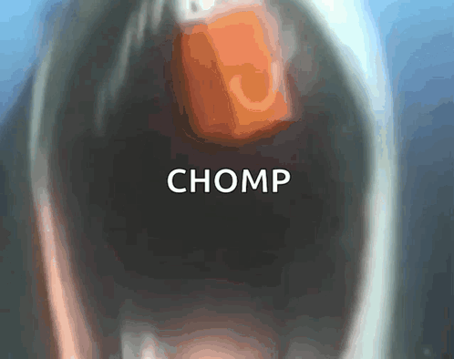 A Close Up Of A Person 'S Mouth With The Word Chomp In White Letters GIF