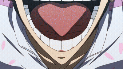 A Close Up Of A Person 'S Mouth With Their Tongue Out GIF