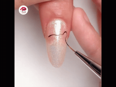 A Close Up Of A Person 'S Nails With The Word Nails On The Bottom Right GIF