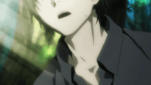 A Close Up Of A Person 'S Neck With A Blurred Background GIF