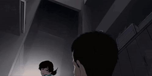A Close Up Of A Person 'S Shoulder With A Green Shirt On GIF