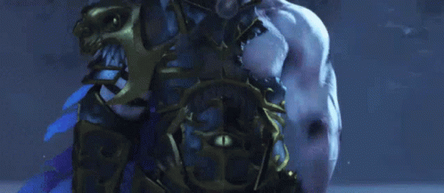 A Close Up Of A Person 'S Torso With A Blue Background GIF