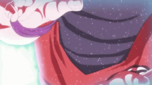 A Close Up Of A Person 'S Torso With A Purple Shirt GIF