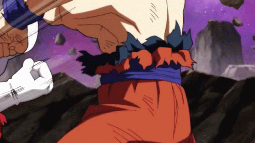 A Close Up Of A Person 'S Torso With A Purple Sky In The Background GIF