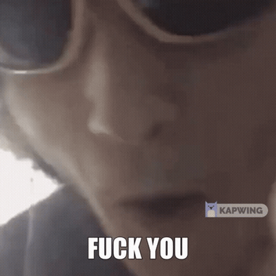 A Close Up Of A Person Screaming With The Words " Fuck You " On The Bottom GIF