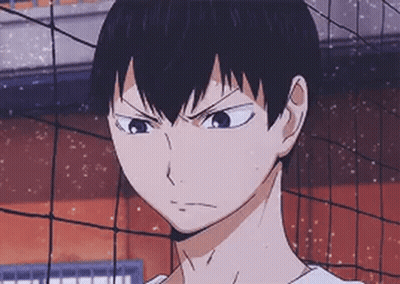 A Close Up Of A Person Standing In Front Of A Volleyball Net With A Serious Look On Their Face . GIF