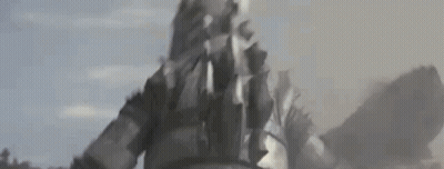 A Close Up Of A Person Standing In The Middle Of A Field With Smoke Coming Out Of Their Mouth . GIF