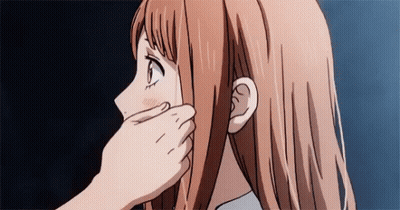 A Close Up Of A Person Touching A Girl 'S Face With Their Hand . GIF
