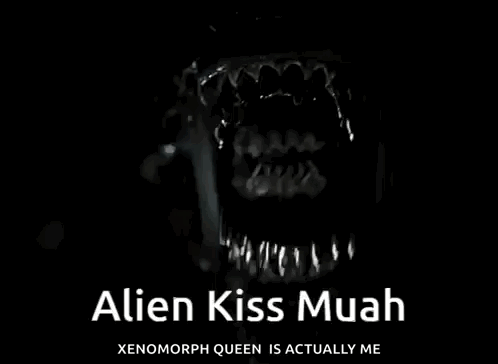 A Close Up Of A Person Wearing A Crown With The Words Alien Kiss Muah Xenomorph Queen Is Actually Me . GIF