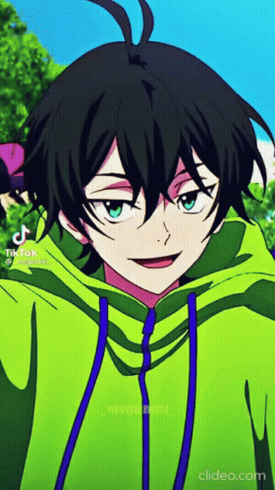 A Close Up Of A Person Wearing A Green Hoodie With A Blue Hood . GIF