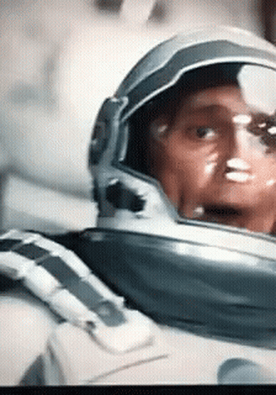 A Close Up Of A Person Wearing A Helmet GIF
