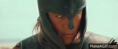 A Close Up Of A Person Wearing A Helmet And Armor . GIF