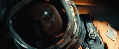 A Close Up Of A Person Wearing A Helmet That Says ' Nasa ' On It GIF
