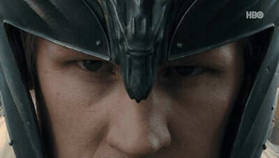 A Close Up Of A Person Wearing A Helmet With Hbo Written On The Bottom GIF