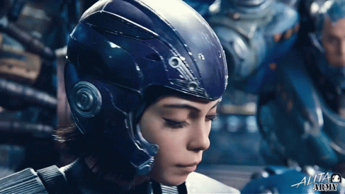A Close Up Of A Person Wearing A Helmet With The Word Alita At The Bottom Right GIF