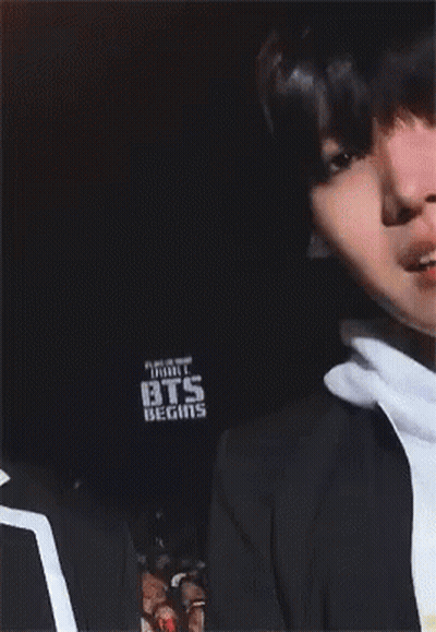 A Close Up Of A Person Wearing A Hoodie That Says Sde GIF