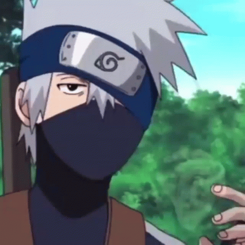 A Close Up Of A Person Wearing A Mask And A Headband With A Circle On It . GIF
