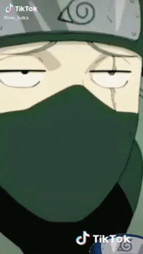 A Close Up Of A Person Wearing A Mask With A Tiktok Logo On The Bottom Right GIF