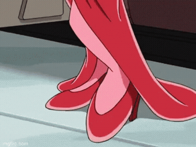 A Close Up Of A Person Wearing A Pair Of Red Shoes . GIF