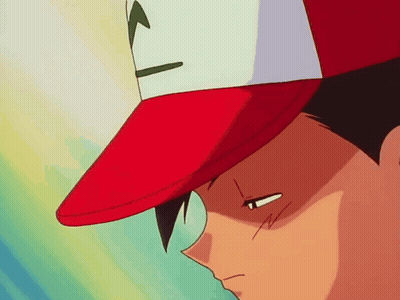 A Close Up Of A Person Wearing A Red Hat With A Pokemon On It GIF